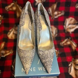 Nine West  4.5” Heel Size 10.5. Color Grey snake skin leather